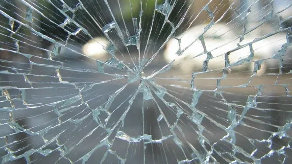 WATCH: Woman Nearly Escapes Death After Huge Ice-Sheet Smashes Her Carâ€™s Windscreen