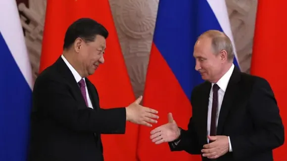 Vladimir Putin and Xi Jinping