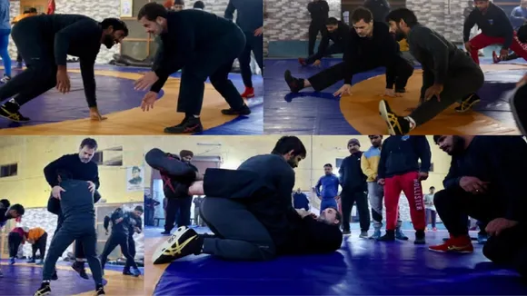 Rahul Gandhi at wrestling floor with Bajrang Punia