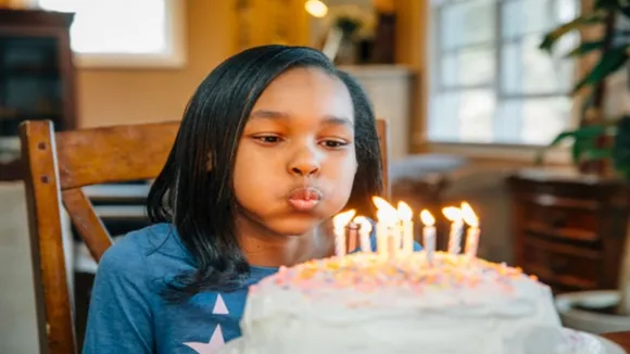 Why do we blow out candles on Before cutting birthday cakes