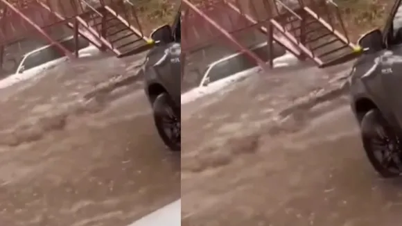 car submerged in flood water