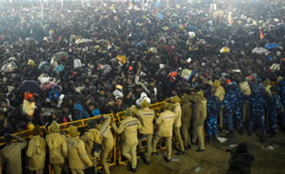 Prayagraj: Police personnel attempt to manage the crowd following a stampede at the Sangam on 'Mauni Amavasya' during the ongoing Maha Kumbh Mela 2025 in Prayagraj on Wednesday, January 29, 2025. (Photo: IANS)