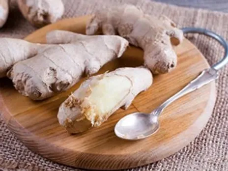 A photo of peeled ginger, which can be a food for helping an upset stomach.