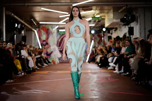 A model presents a creation from British designer Mark Fast during a catwalk show for the Spring/Summer 2022 collection on the first day of London Fashion Week in London on Sept. 17, 2021.