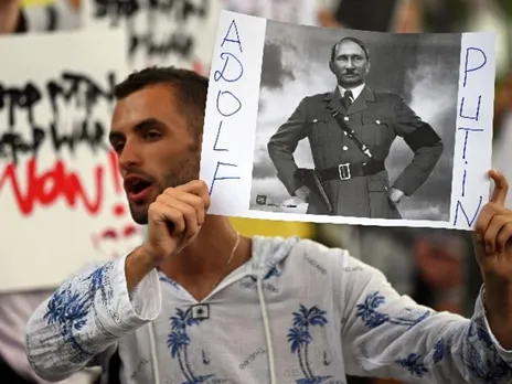 Ukrainians protest in front of the Russian Embassy in Madrid, Spain. 