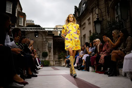 A model presents a creation from design house Paul & Joe, founded by French designer Sophie Mechaly, during a catwalk show for the Spring/Summer 2022 collection on the fourth day of London Fashion Week in London on Sept. 20, 2021.