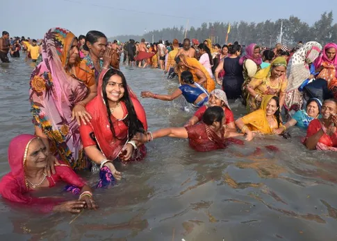 Devotees Take Holy Dip In Ganga On Makar Sankranti