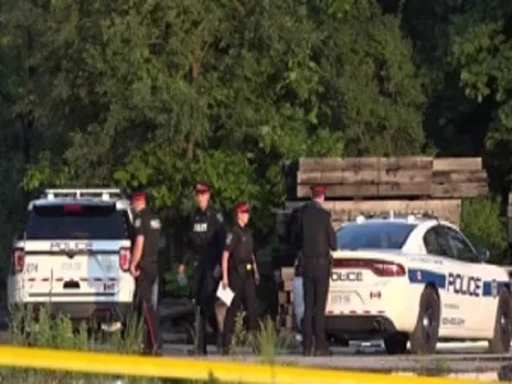 Burning car with a body inside found in open lot, Mississauga