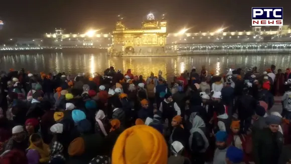 Braving severe cold, sea of devotees throng Golden Temple on New Year