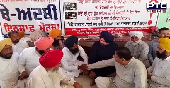 Congress leader Navjot Sidhu joins protest at Behbal Kalan