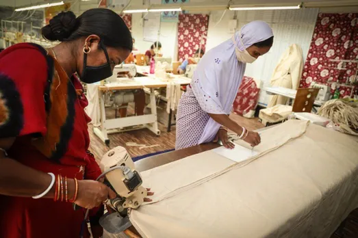 SHG Women Making bedsheets 