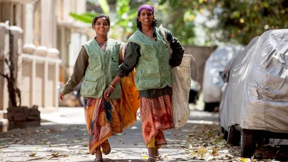 Women collecting plastic