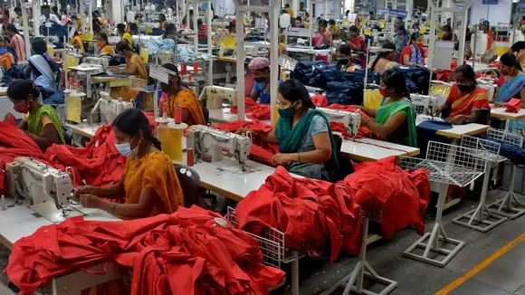 women stiching clothes in bulk