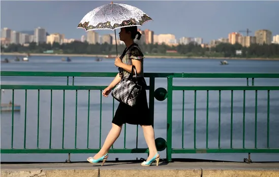 In High Heels And Grassroot Capitalism, North Korean Women Find Liberation