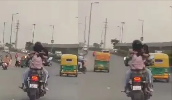 "Traffic Violation:" Delhi Police React To Couple's PDA On Moving Bike