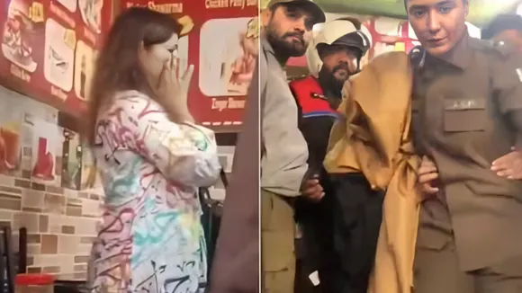 woman rescued by police after mob attacks her for wearing arabic print kurta