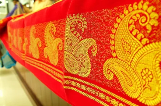 Mysore Silk saree with golden Zari border Picture By: Wikipedia