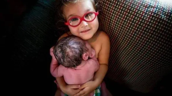 Three-Year-Old Helps Deliver Baby, Picture Goes Viral