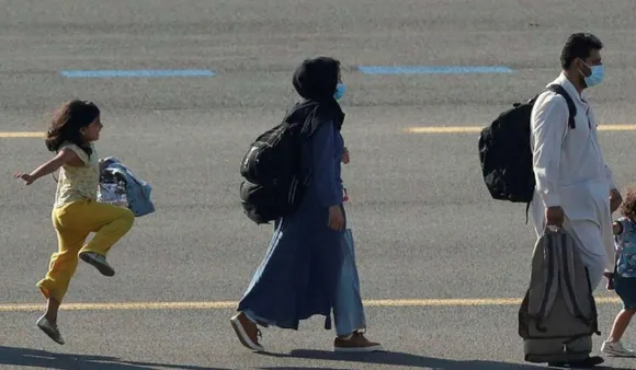Viral Image Of Evacuated Afghan Girl Skipping With Joy Stirs Both Doom And Hope