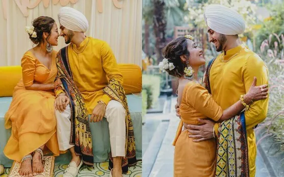 Neha Kakkar And Rohanpreet Singh Pose In Yellow For Their Haldi Ceremony