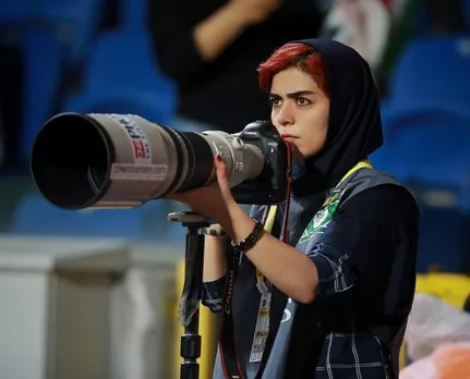 In A First, Iran Woman Photographer Covers Men’s Football