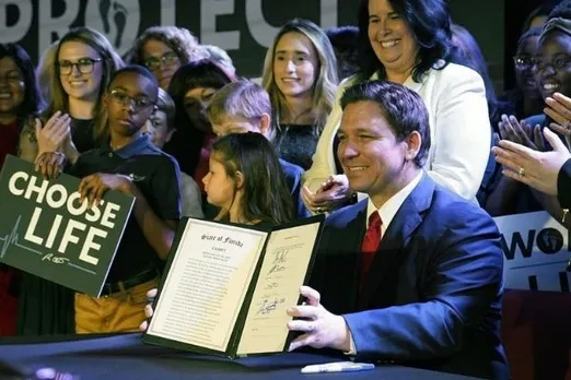 In Case You Missed: Florida Governor Signed 15-Week Abortion Ban Law With A Smile