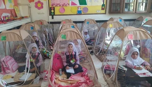 Picture Of Girls Sitting In Plastic Tents Goes Viral After Iran Reopens Schools