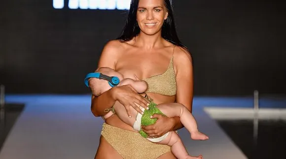 Sports Illustrated Model Breastfeeds Baby On Runway