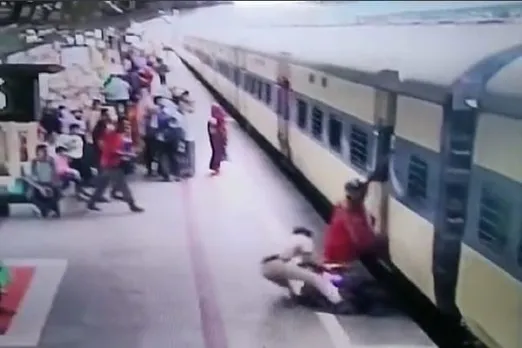 railway cop drags woman from gap