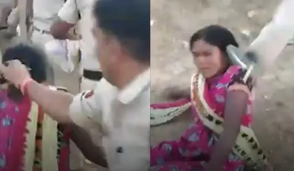 Police Officer Pulls Woman's Hair, Kicks Her During Anti-Encroachment Drive
