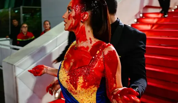 Cannes 2023: Woman Draped In Ukrainian Flag Colour Pours 'Fake Blood' On Herself