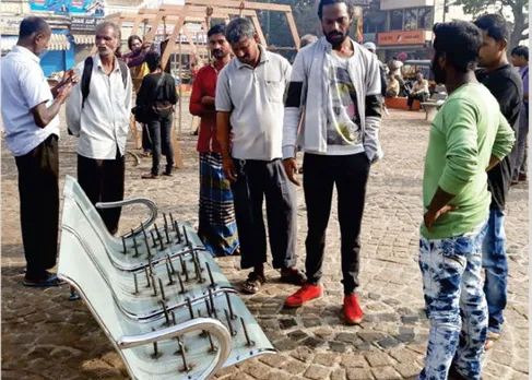 Street Artist Protests Sexual Harassment Of Women With Bench Of Nails