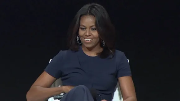 Michelle Obama presses on need to educate young girls