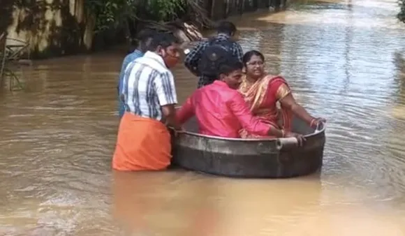 Kerala Couple Wedding: Amidst Floods, Couple Reaches Venue In Cooking Vessels