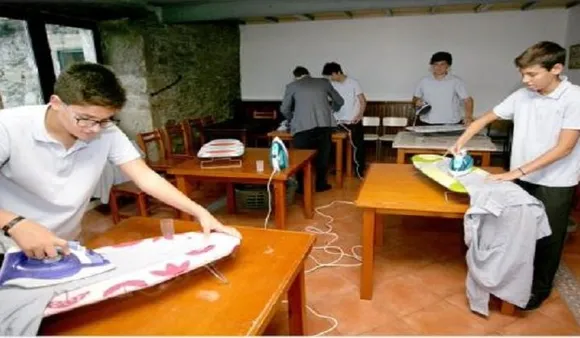 Boys Learning Domestic Chores In Home Economics Class: About Time