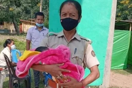 Helping Hands: Assam Cops Cradle Babies While Their Mothers Write Exams