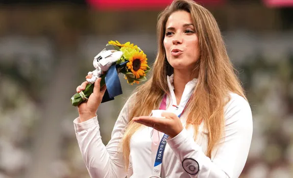 Tokyo Olympics medalist Maria Andrejczyk auctions her silver medal to raise funds for an eight-month old's heart surgery