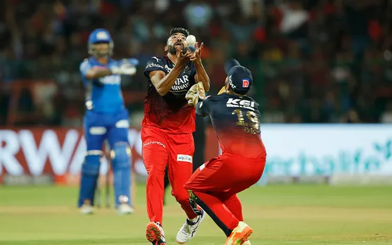 Watch: Dinesh Karthik and Mohammed Siraj collide as Bangalore lose chance to dismiss Rohit Sharma