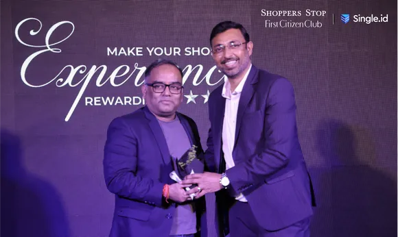Kavindra Mishra, Customer Care Associate, Managing Director and CEO, Shoppers Stop with Chandra Bhushan, India Country Head, Enigmatic Smile.png