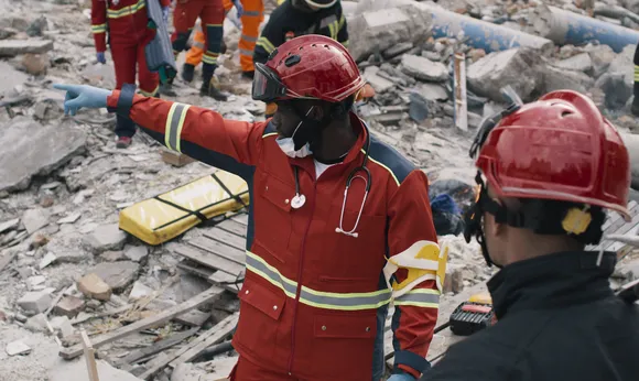 Humanitarian workers during rescue mission after earthquake.jpg