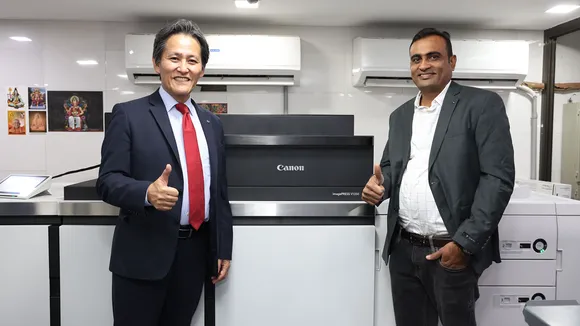 Mr. Manabu Yamazaki, President and CEO, Canon India and Mr Rajesh Mandora, Owner, Prince Graphics with the newly-launched imagePRESS V1350 