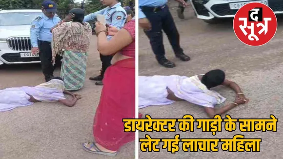 woman lay down front of plant director's car in masturi