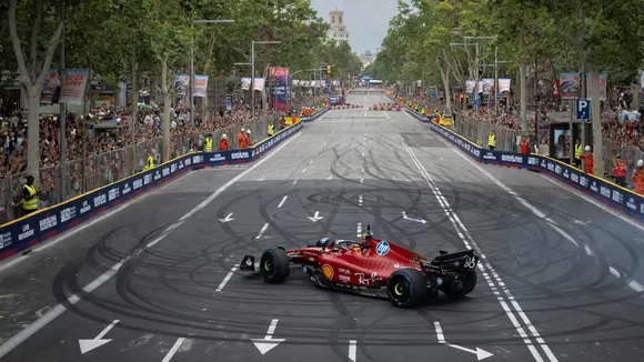 WATCH: Carlos Sainz makes iconic donuts with his Ferrari at Barcelona F1 roadshow