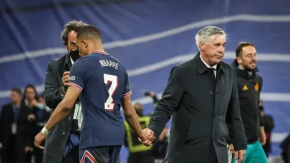 Kylian Mbappe and Carlo Ancelotti