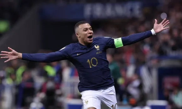 When will Kylian Mbappe make his competitive debut for Real Madrid?