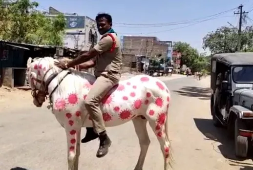 கொரோனா விழிப்புணர்வு - பாராட்டும், திட்டும் வாங்கிய ஆந்திர போலீஸ்காரர்