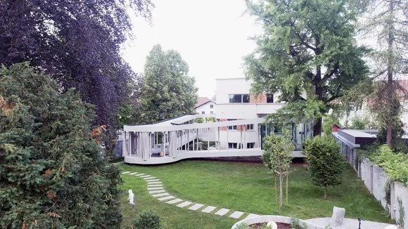 OFIS Arhitekti Revives 1930s Ljubljana Villa with Modern Extension