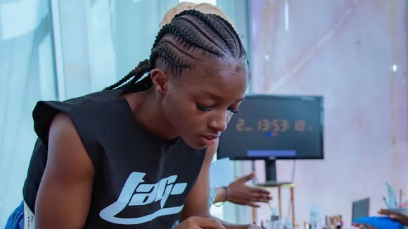 Nigerian Teen Paints Over 4,000 Nails in Record-Breaking Attempt