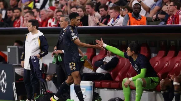 Real Madrid's Bellingham Substituted Due to Cramp in 2-2 Champions League Draw with Bayern Munich