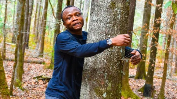Ghanaian Environmentalist Breaks Guinness World Record by Hugging 1,123 Trees in One Hour